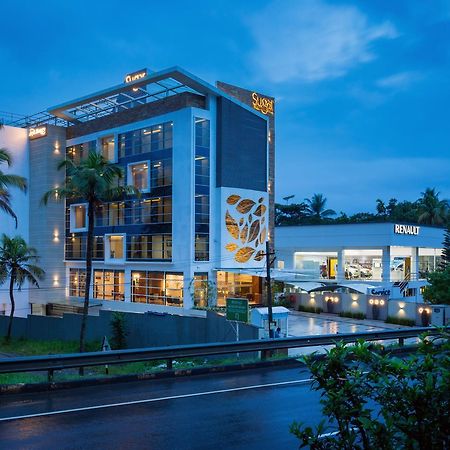 Sugar Business Hotel Kochi Bagian luar foto
