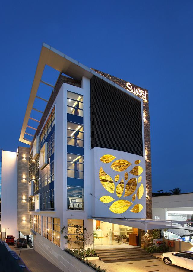 Sugar Business Hotel Kochi Bagian luar foto