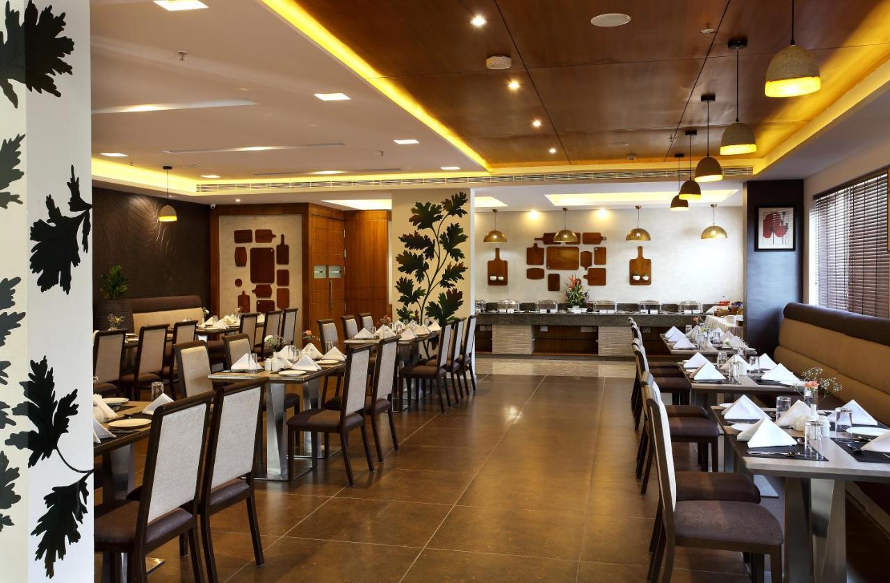 Sugar Business Hotel Kochi Bagian luar foto