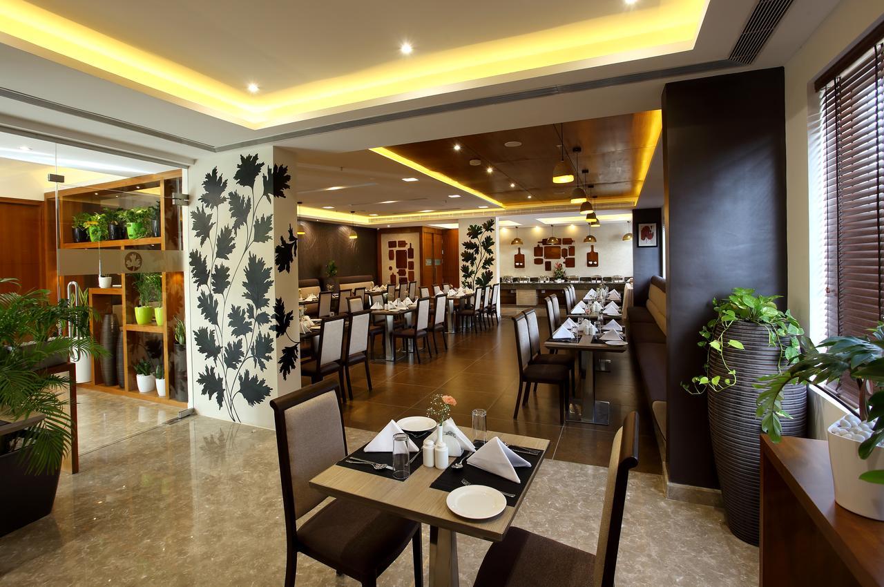 Sugar Business Hotel Kochi Bagian luar foto