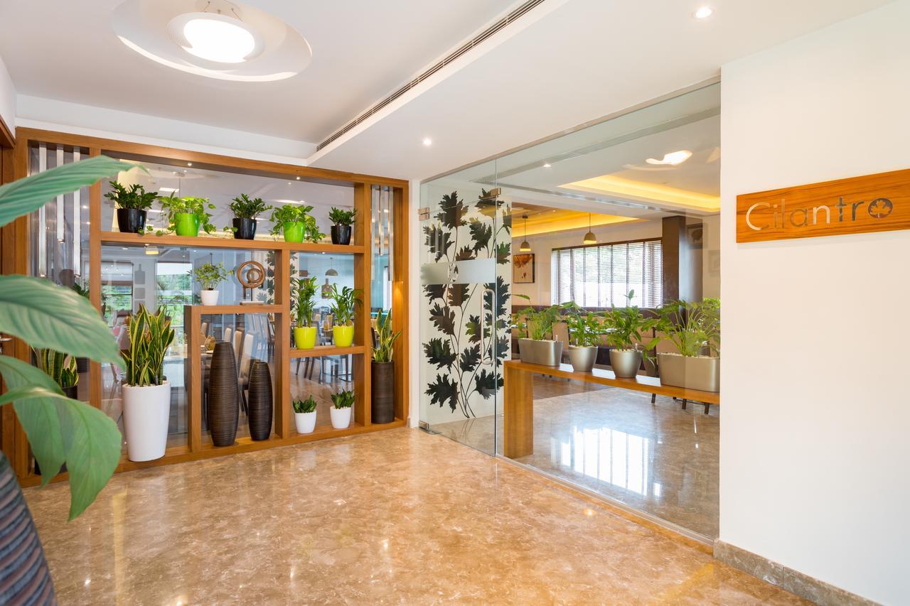 Sugar Business Hotel Kochi Bagian luar foto