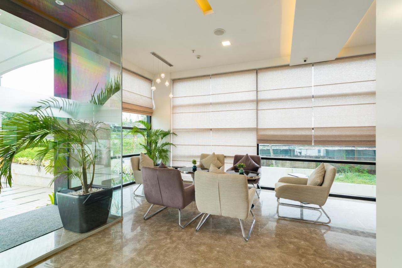 Sugar Business Hotel Kochi Bagian luar foto