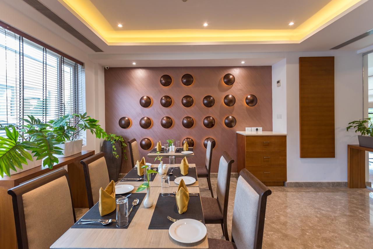 Sugar Business Hotel Kochi Bagian luar foto