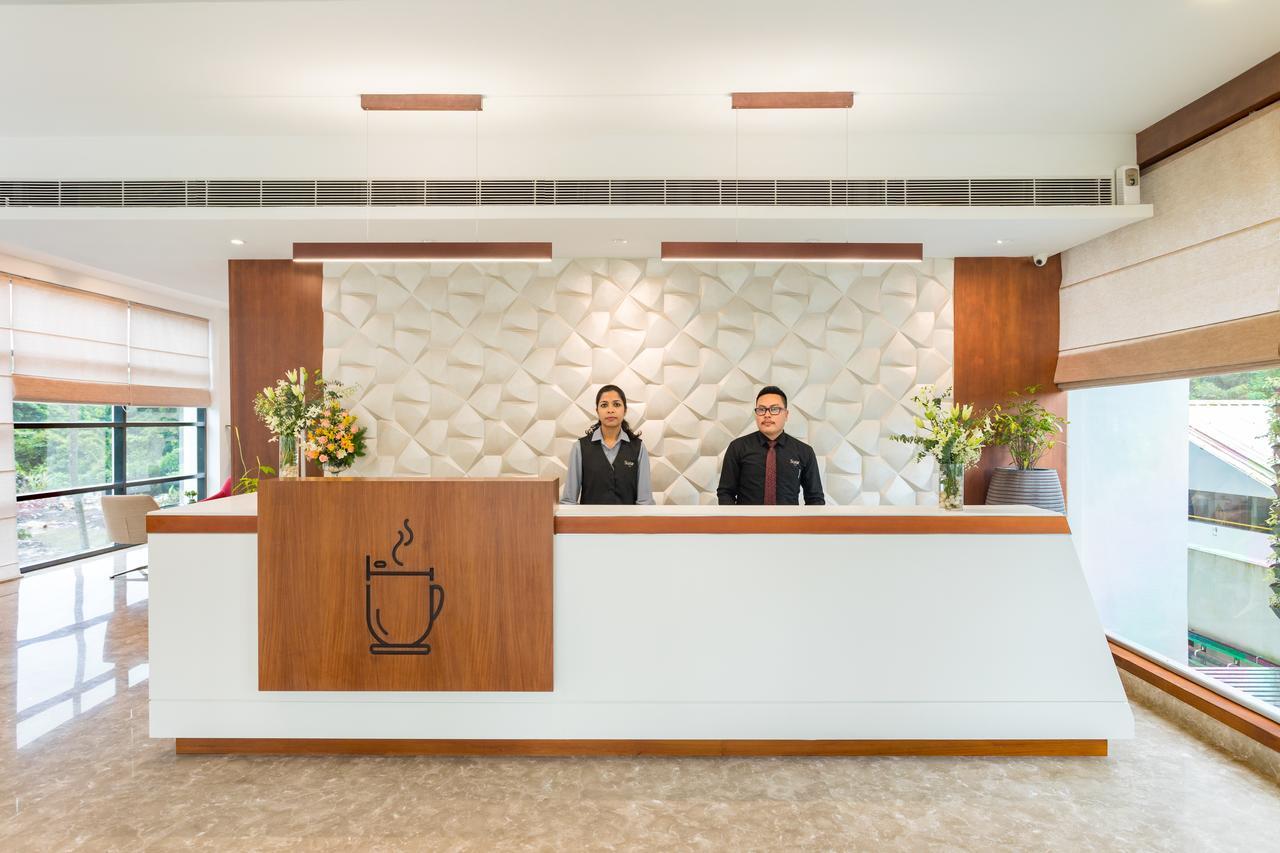 Sugar Business Hotel Kochi Bagian luar foto