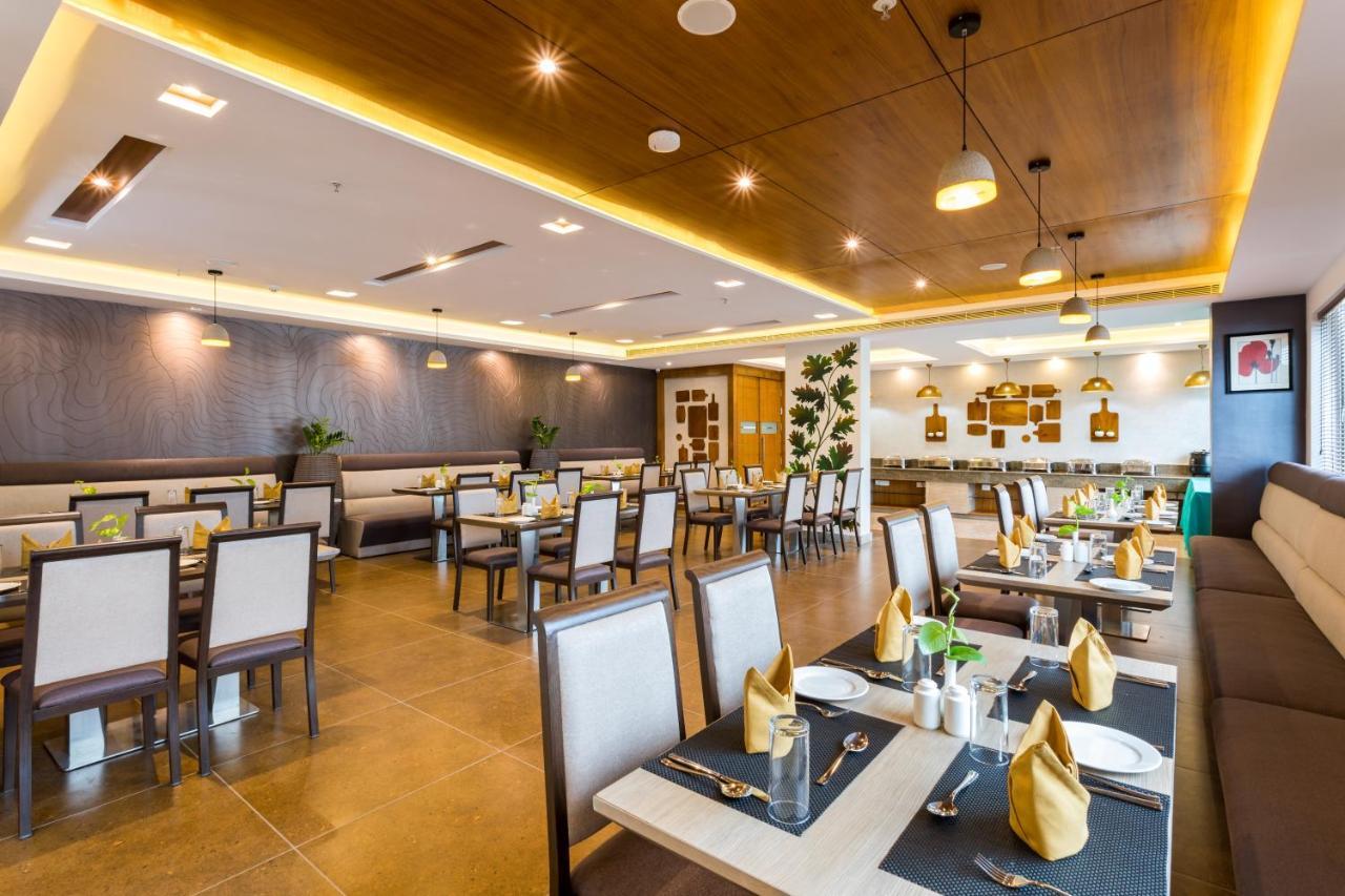 Sugar Business Hotel Kochi Bagian luar foto